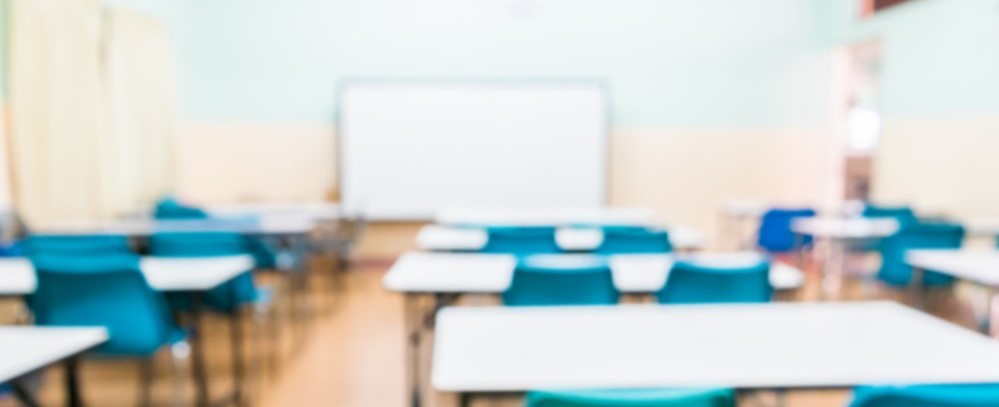 Blurred image of empty classroom